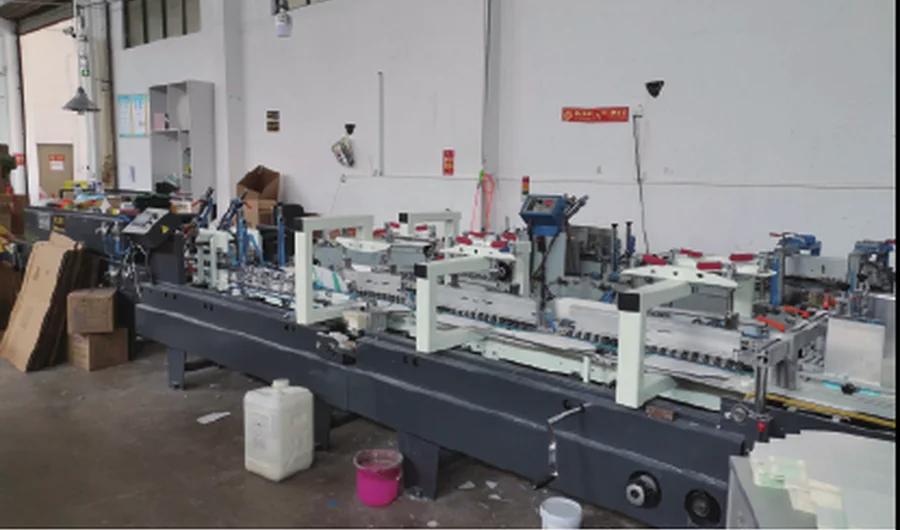 Box gluing equipment